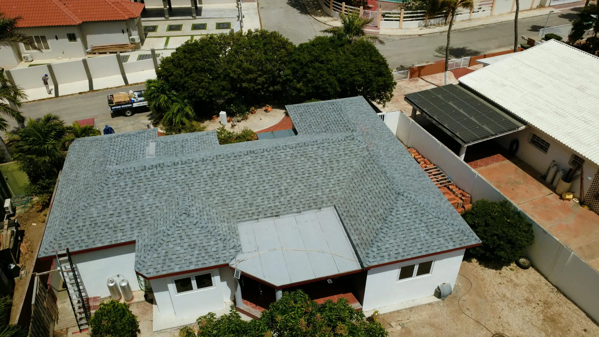 Shingle Roofing & Replacement project by Optimo Roofing in Aruba
